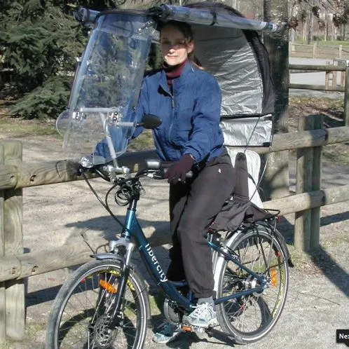 The Veltop is a removable windscreen/canopy/side window system, for protecting cyclists from rain and cold winds