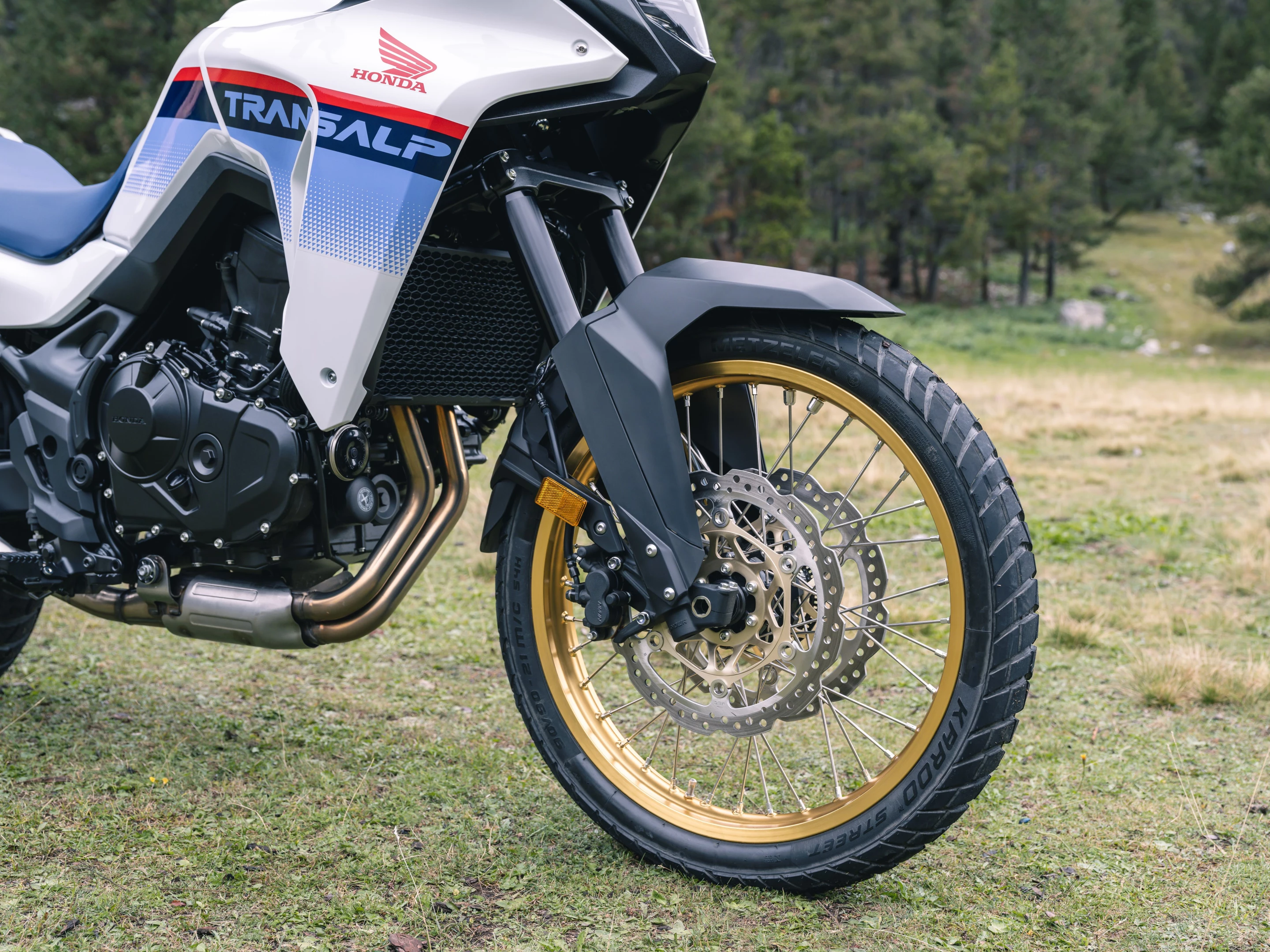 Honda went for a pair of 310-mm discs with two-piston calipers and non-adjustable Showa forks for the 2023 XL750 Transalp