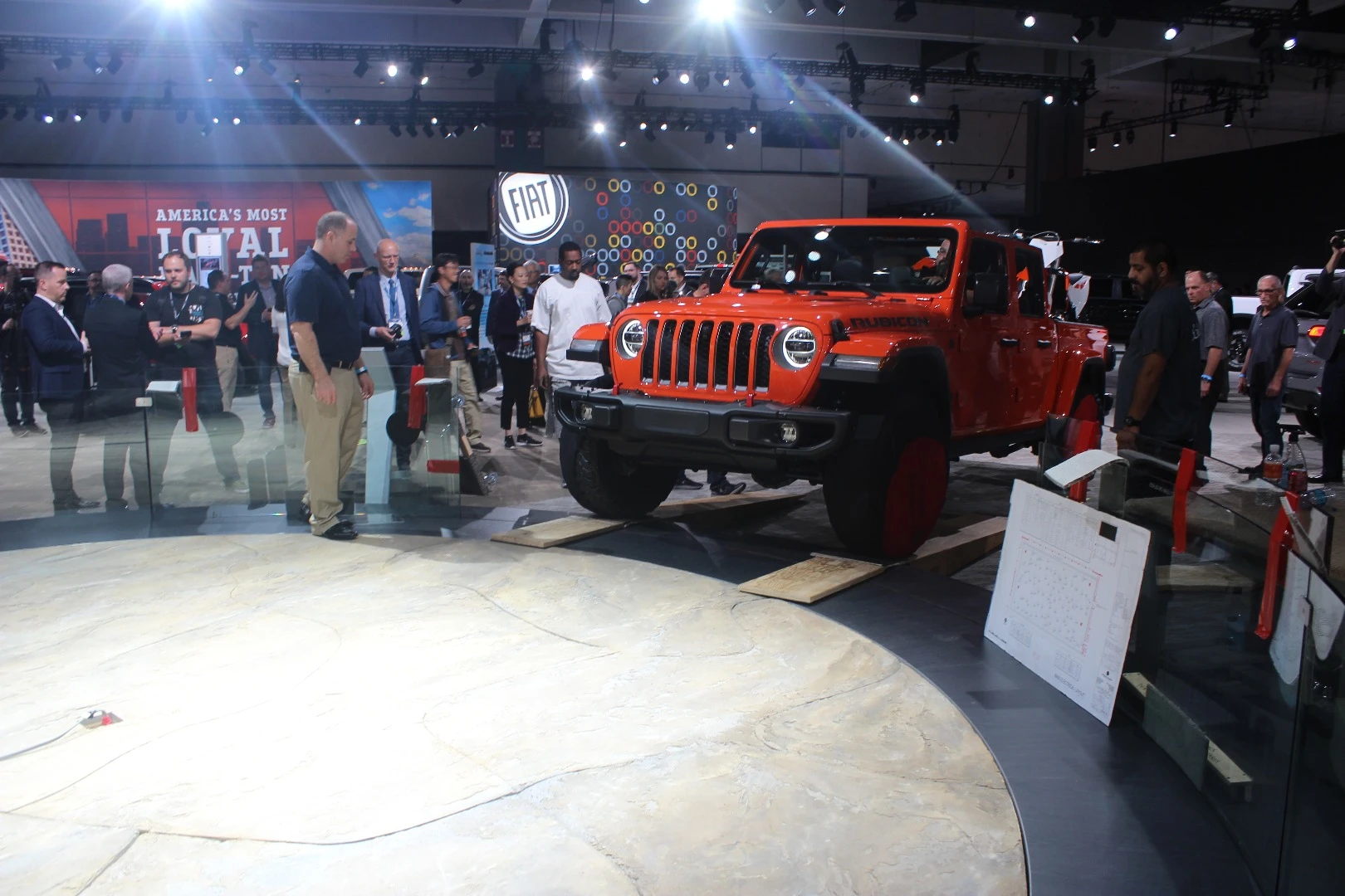 From this angle, as the Jeep Gladiator pulls into position on stage, it's not as easy to tell that it's not another Wrangler model