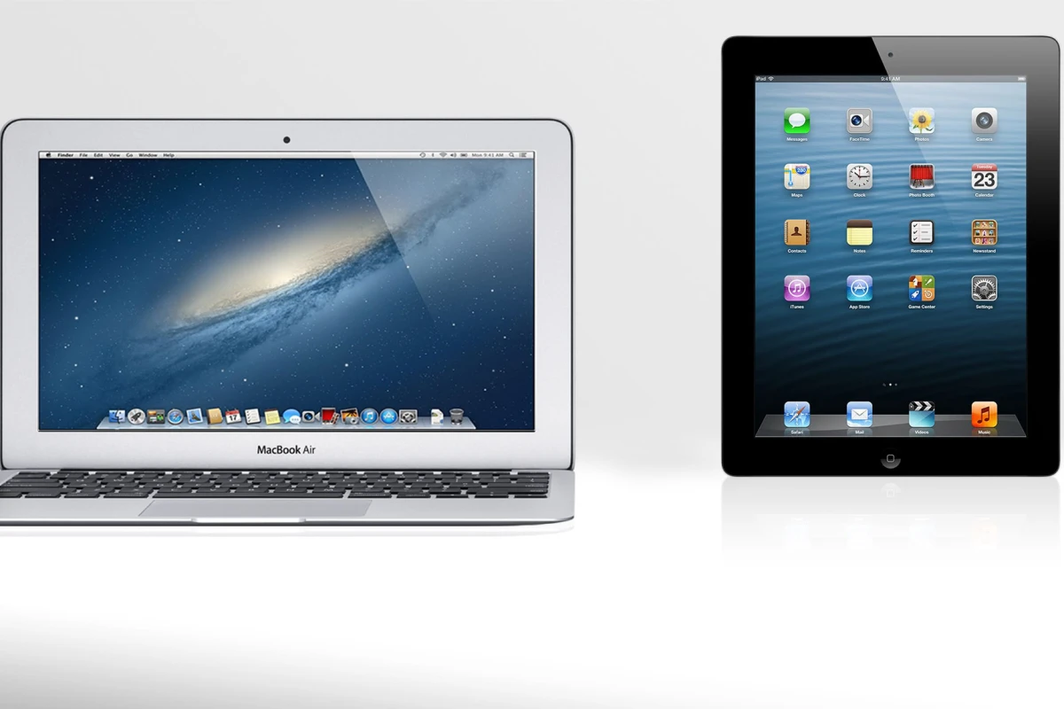 Gizmag compares the specs (and other features) of the 11-inch MacBook Air and the 4th-generation iPad