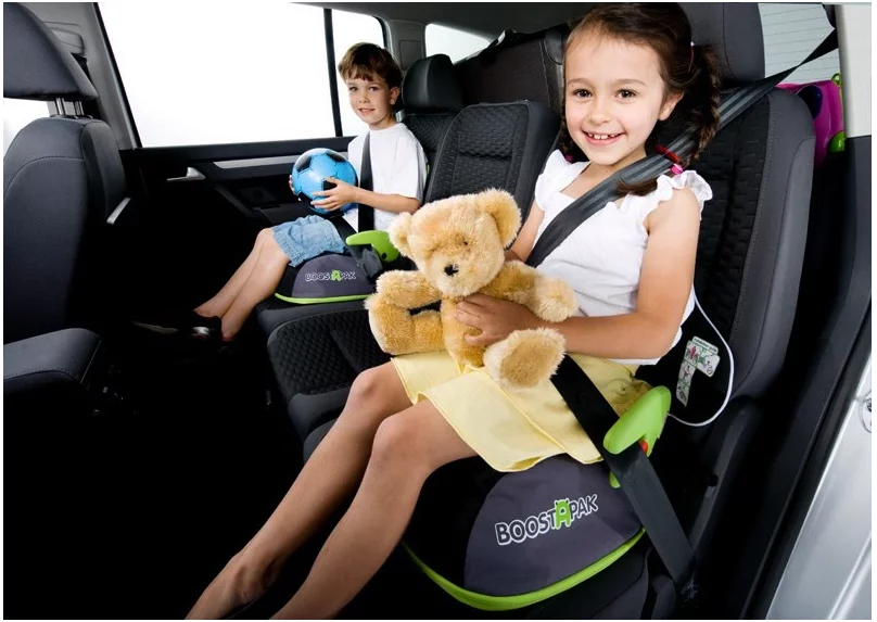 The BoostApak coverts from child's backpack to approved booster seat