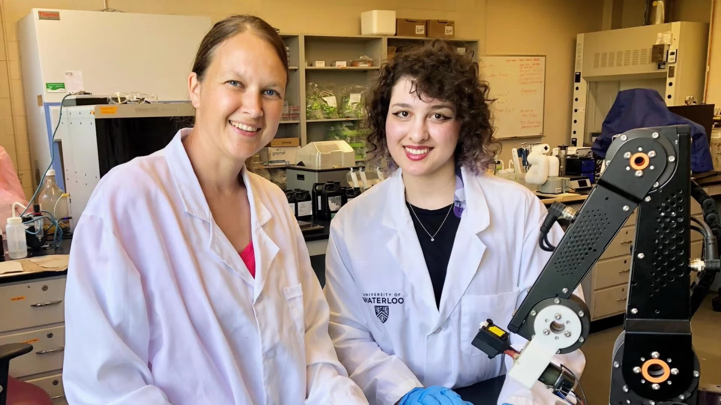 Lead scientist Dr. Veronika Magdanz (left) and team member Afarin Khabbazian, along with the arm used to guide the filaments