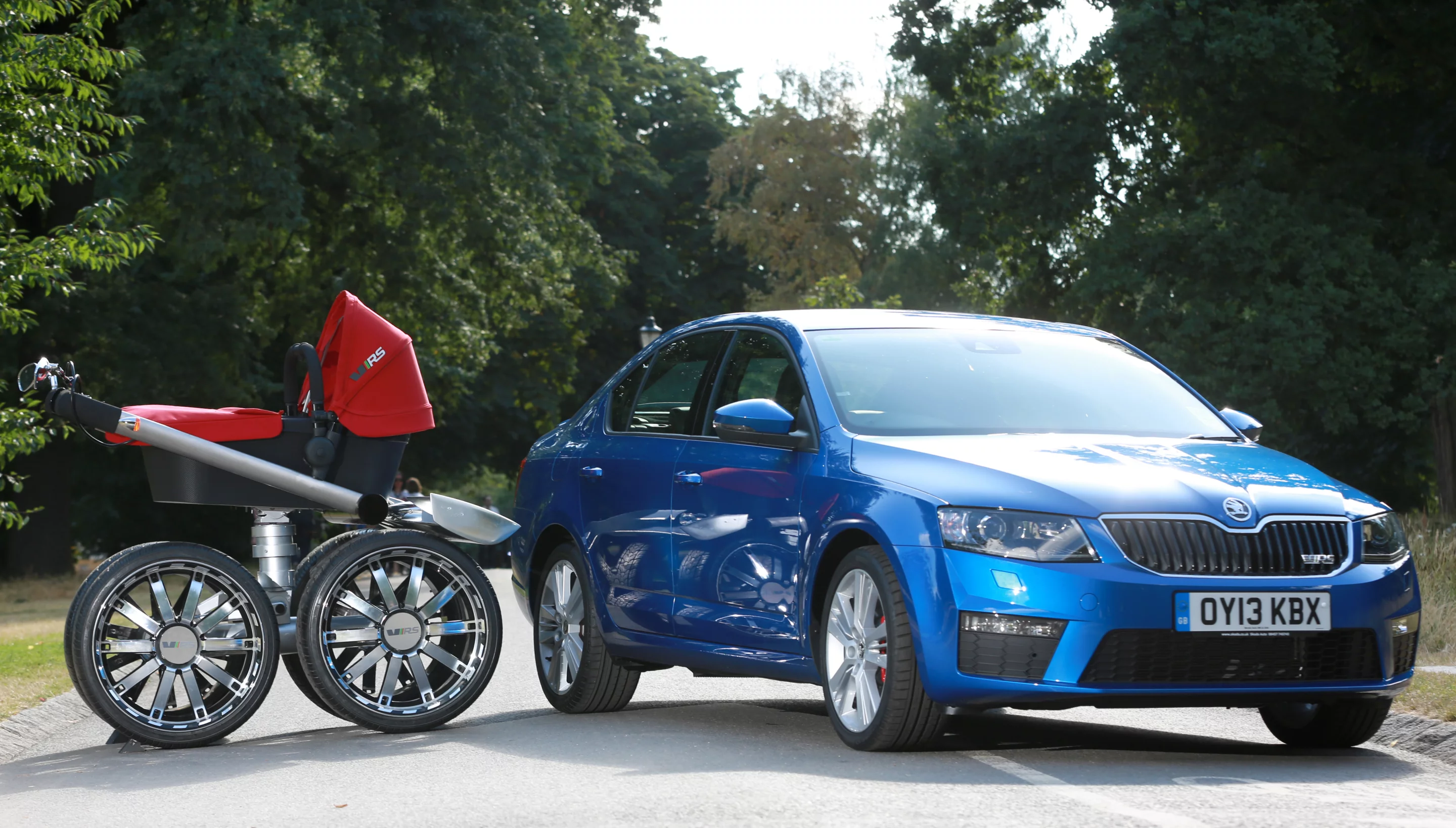 The VRS Mega Man-Pram features hydraulic suspension, wing mirrors, oversized brake calipers, brake lights and a headlamp for night walks