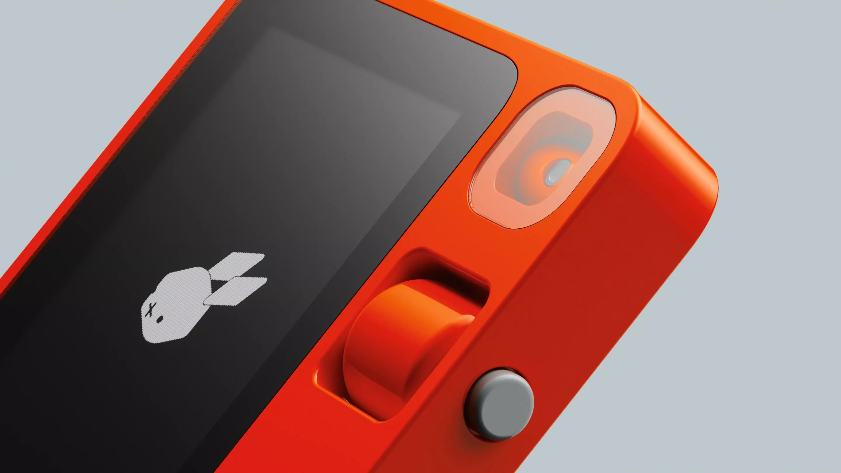 There's a push button on the side to activate the microphone for voice interaction, a scroll wheel for menu navigation as well as a touchscreen display, and a rotating videocam