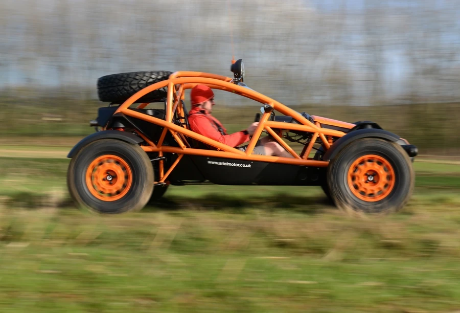 A side view of the Ariel Nomad in action