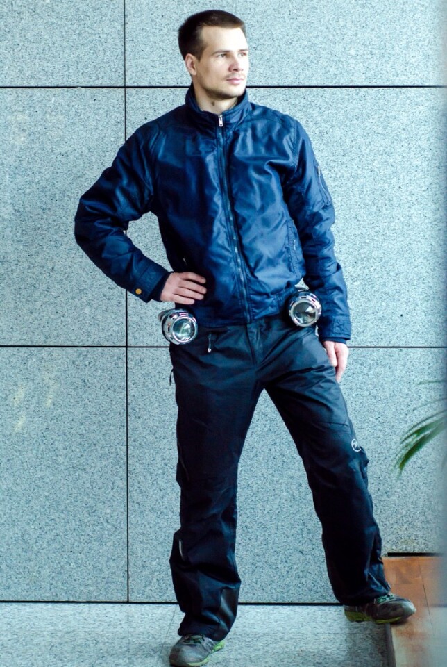 The Repulsor secures to the back of belts, and flexible arms allow the lenses to aim in almost any direction