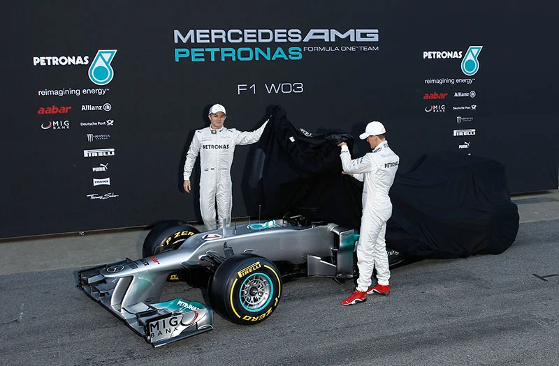Michael Schumacher, Nico Rosberg and the 2012 Mercedes AMG Petronas F1 car