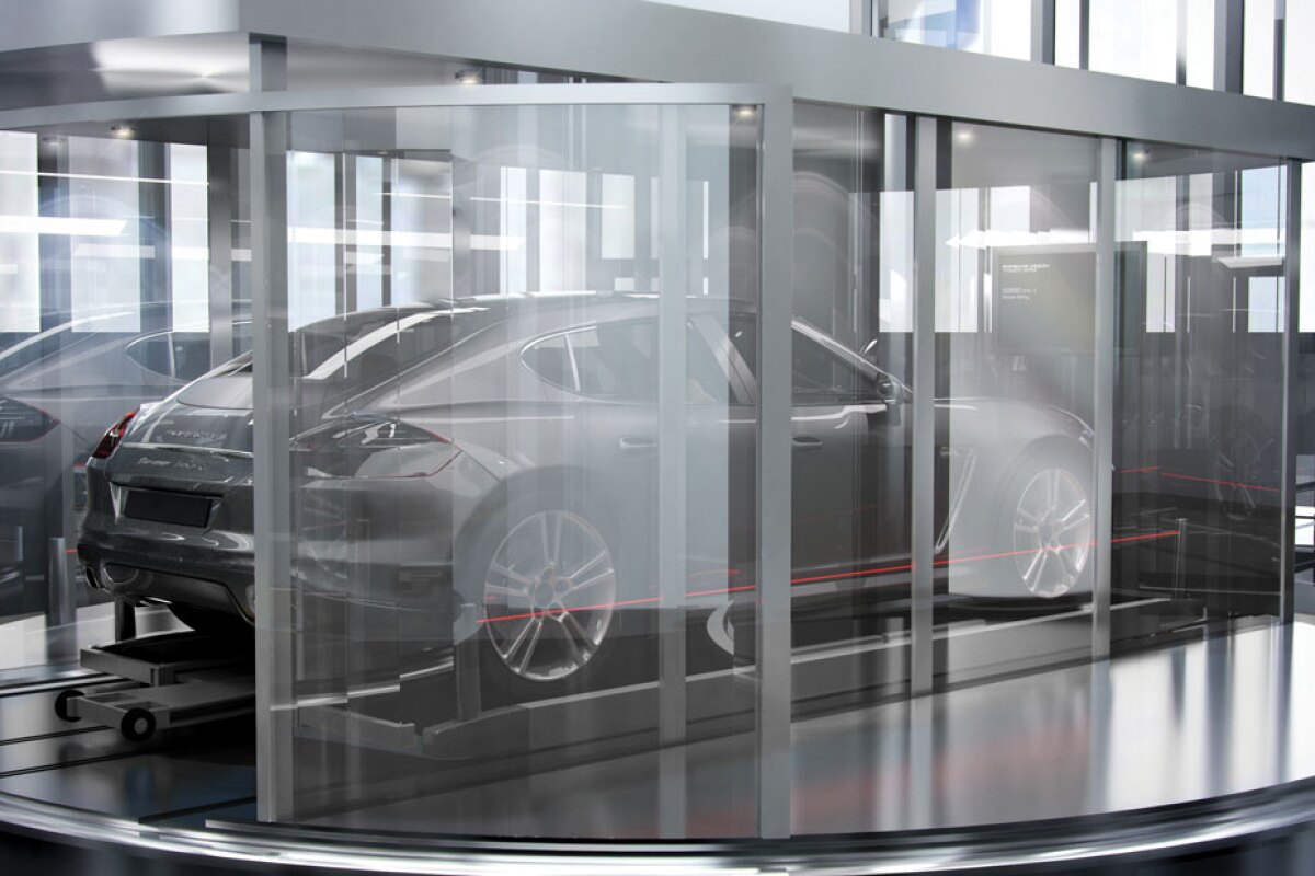 Glass elevators transport cars to the desired floor and park them in the apartment's "Sky Garage" (Image: Porsche Design)