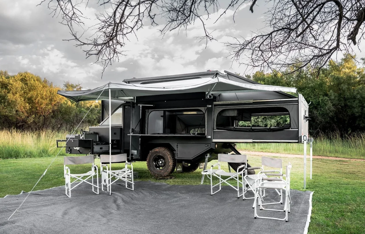 Berg's new CX6 trailer rolls fairly compact at under 18 feet long but absolutely explodes in size at camp, sleeping up to six and providing an indoor/outdoor base camp for even more people during the day