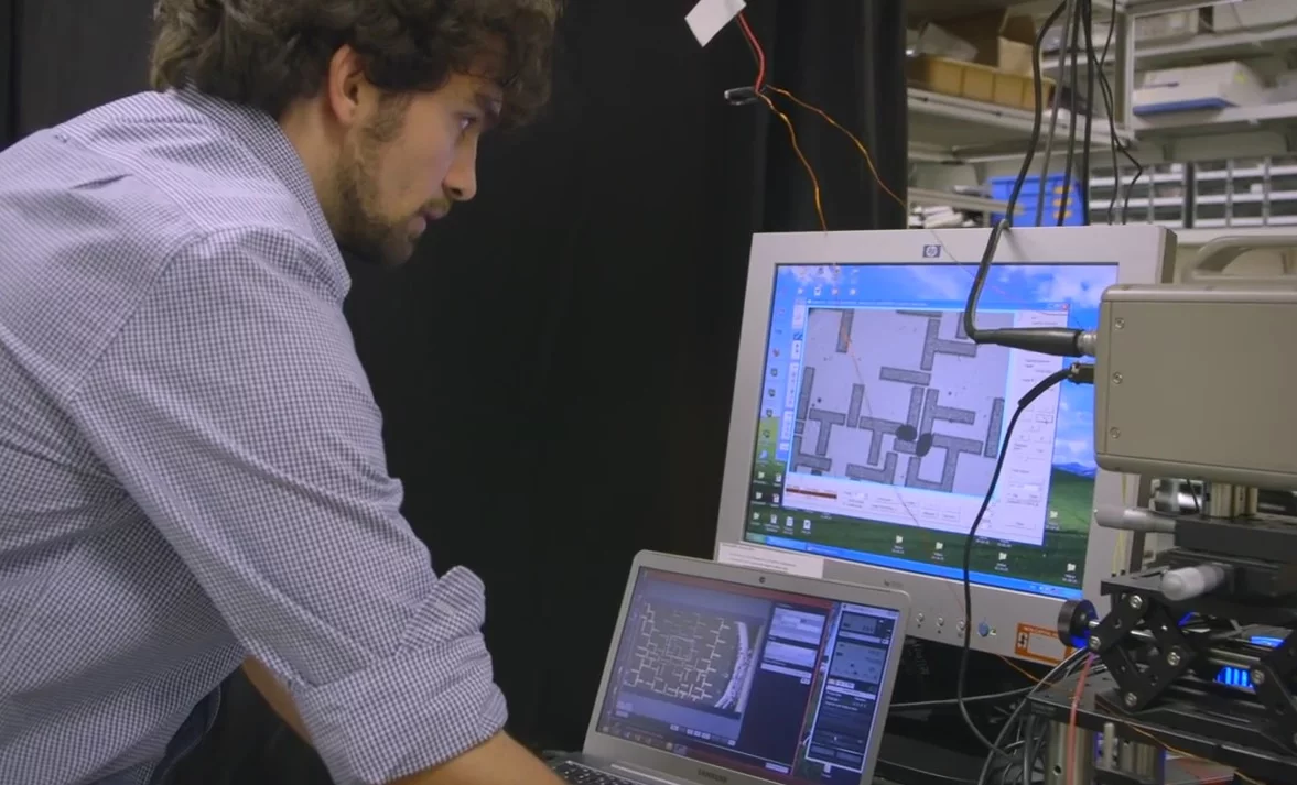 Georgios Katsikis watches the movement of the water droplets on a computer monitor