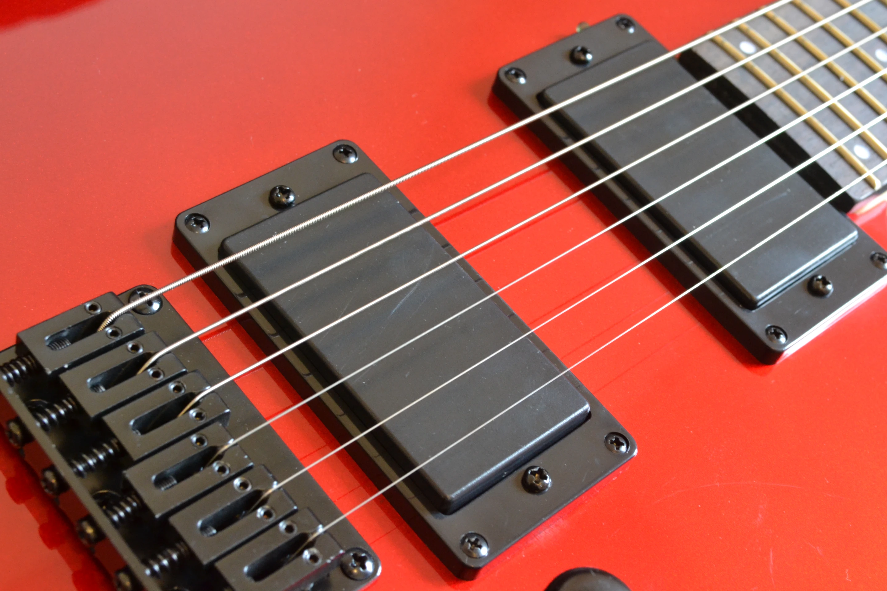The AT-200 features two Peavey USA humbucking pickups, both covered