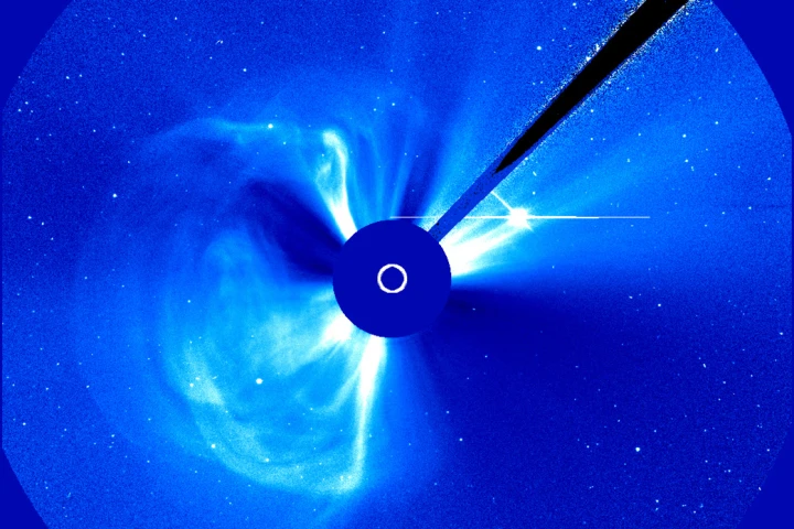 Taken by the SOHO observatory, this image of the Sun (eclipsed in the center by the instrument) shows the coronal mass ejection that burst forth on October 14, 2014