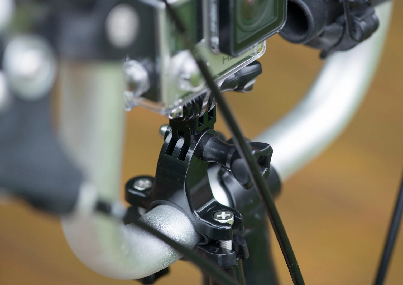 The GoPro Handlebar Mount easily attached to your bike