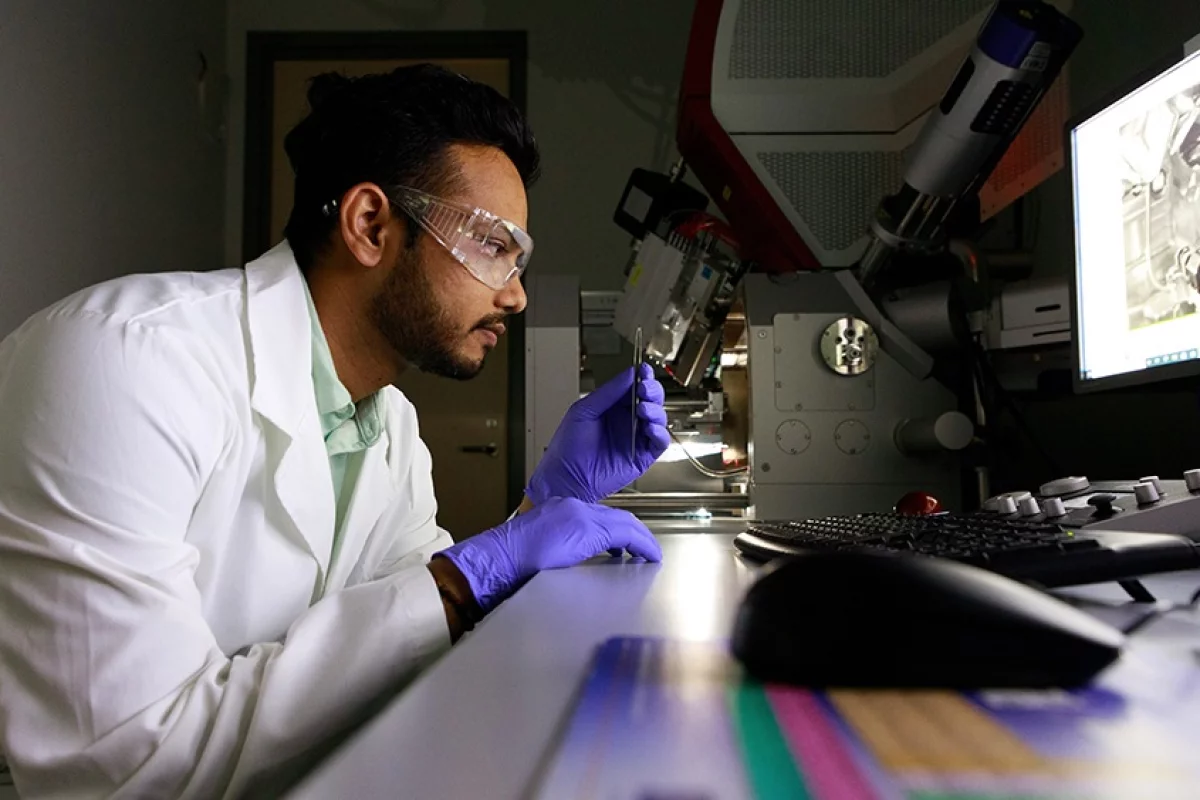 Lead author Hemant Rathod, with a sample of the self-healing ceramic material, chromium aluminum carbide