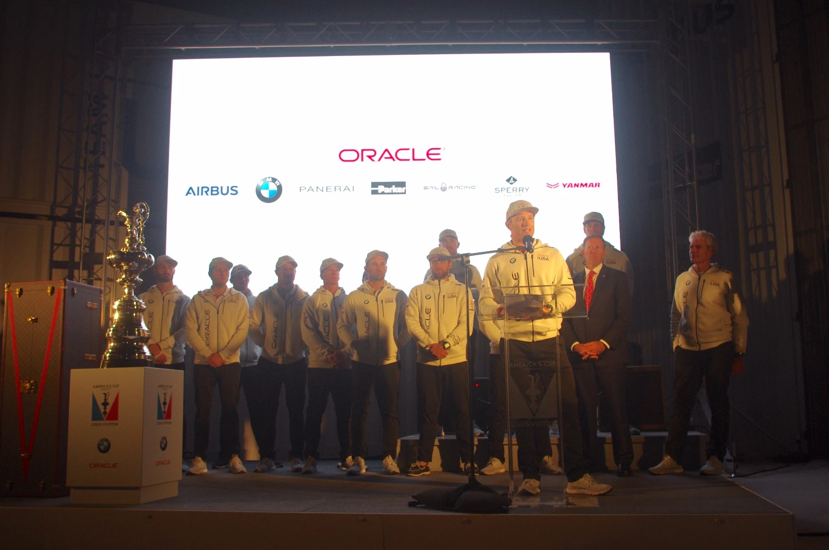 The Oracle Team USA crew, along with the America's Cup trophy