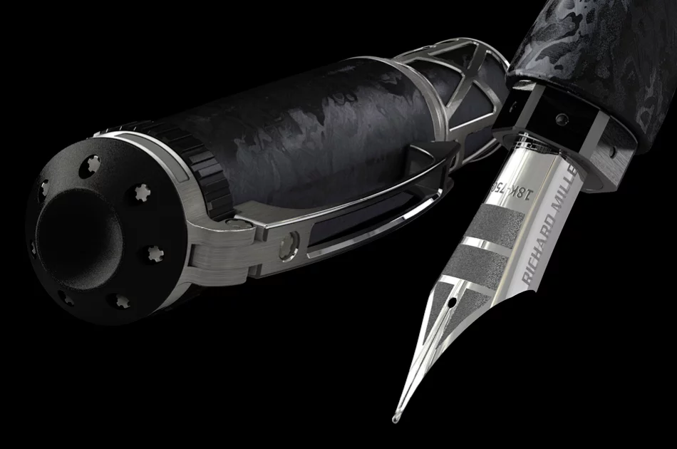 The Richard Mille RMS05 fountain pen uses a precision watch mechanism to extend the white-gold nib