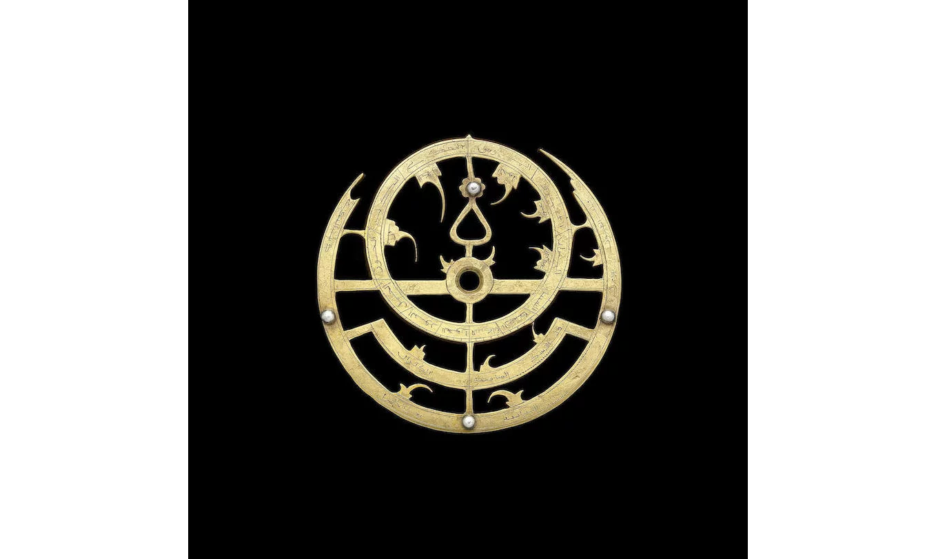 A small brass copy of a 16th century Ottoman astrolabe, detail