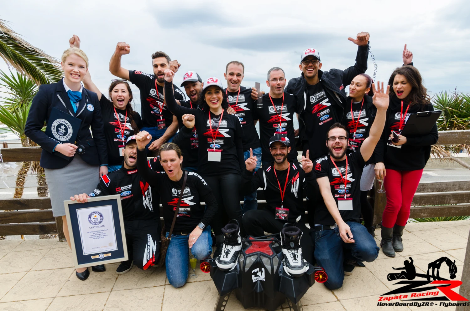 The Zapata Racing team celebrates a new world record for the farthest flight by hoverboard