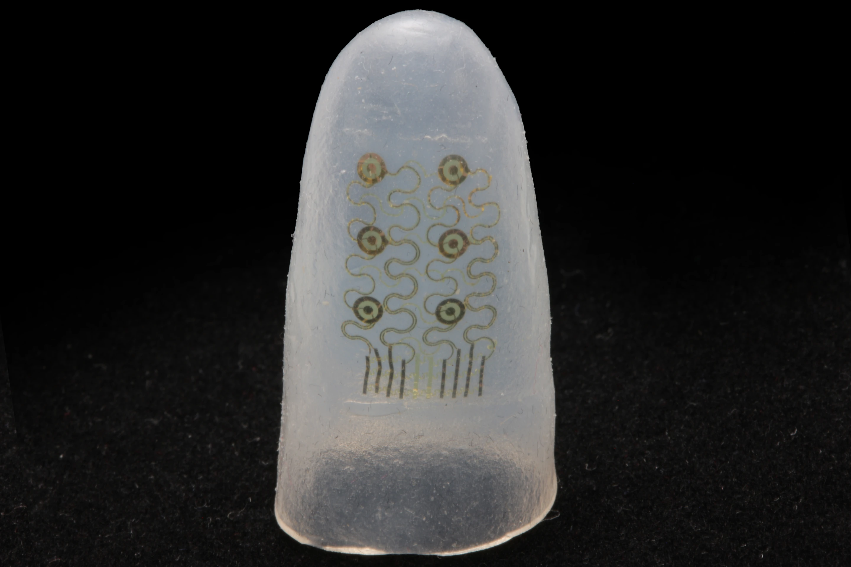 To create the device, a flexible polymer is repeatedly poured onto a model finger until it achieves the desired thickness (Image: John Rogers/University of Illinois)