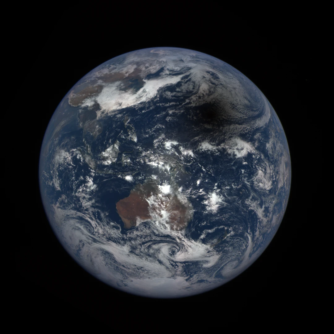 The shadow of a total solar eclipse crossing over the Earth in 2016