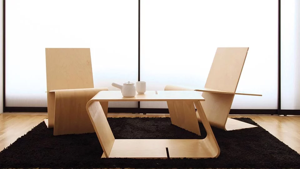 LLSTOL is a simple wooden lounge chair that can be quickly and easily transformed into a coffee table or dismantled for storage