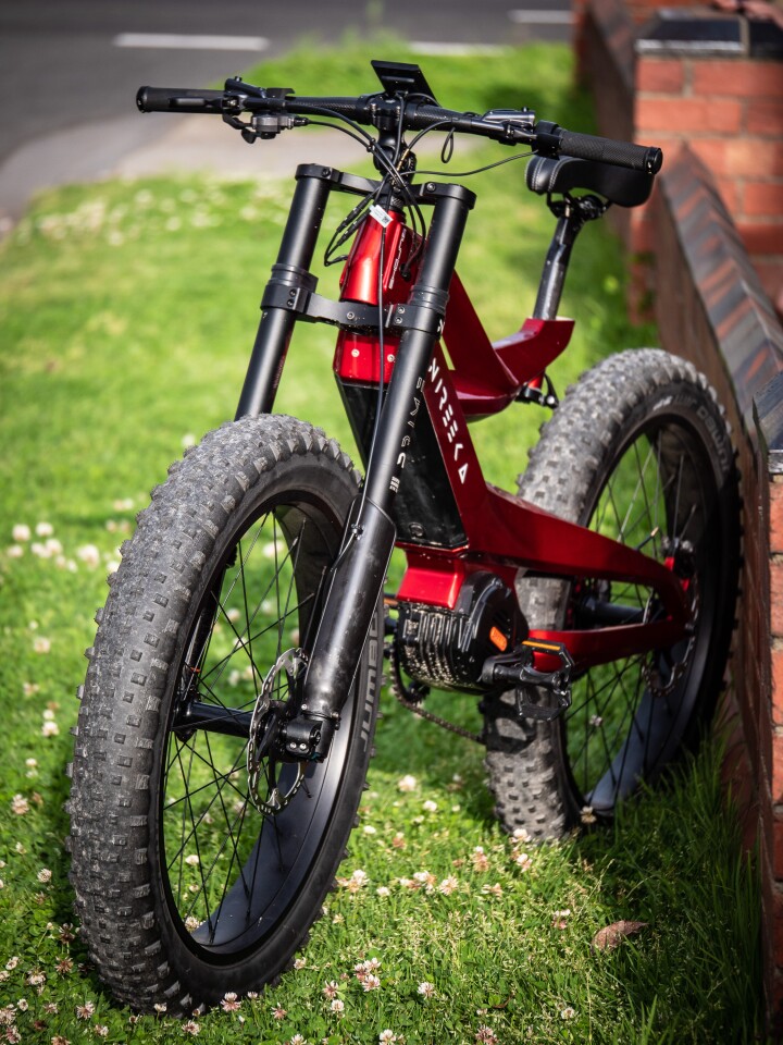 The full-length, adjustable air fork requires a tasty set of machined triple clamps