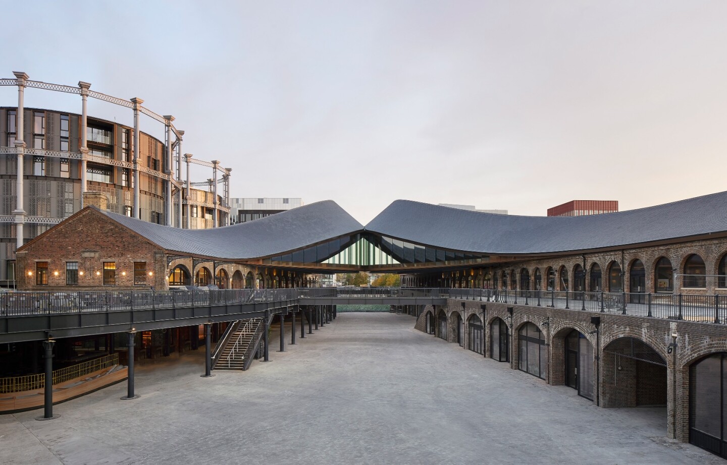 London's Coal Drops Yard was designed by Heatherwick Studio and involved adapting two dilapidated Victorian-era coal storage buildings into a stunning shopping center