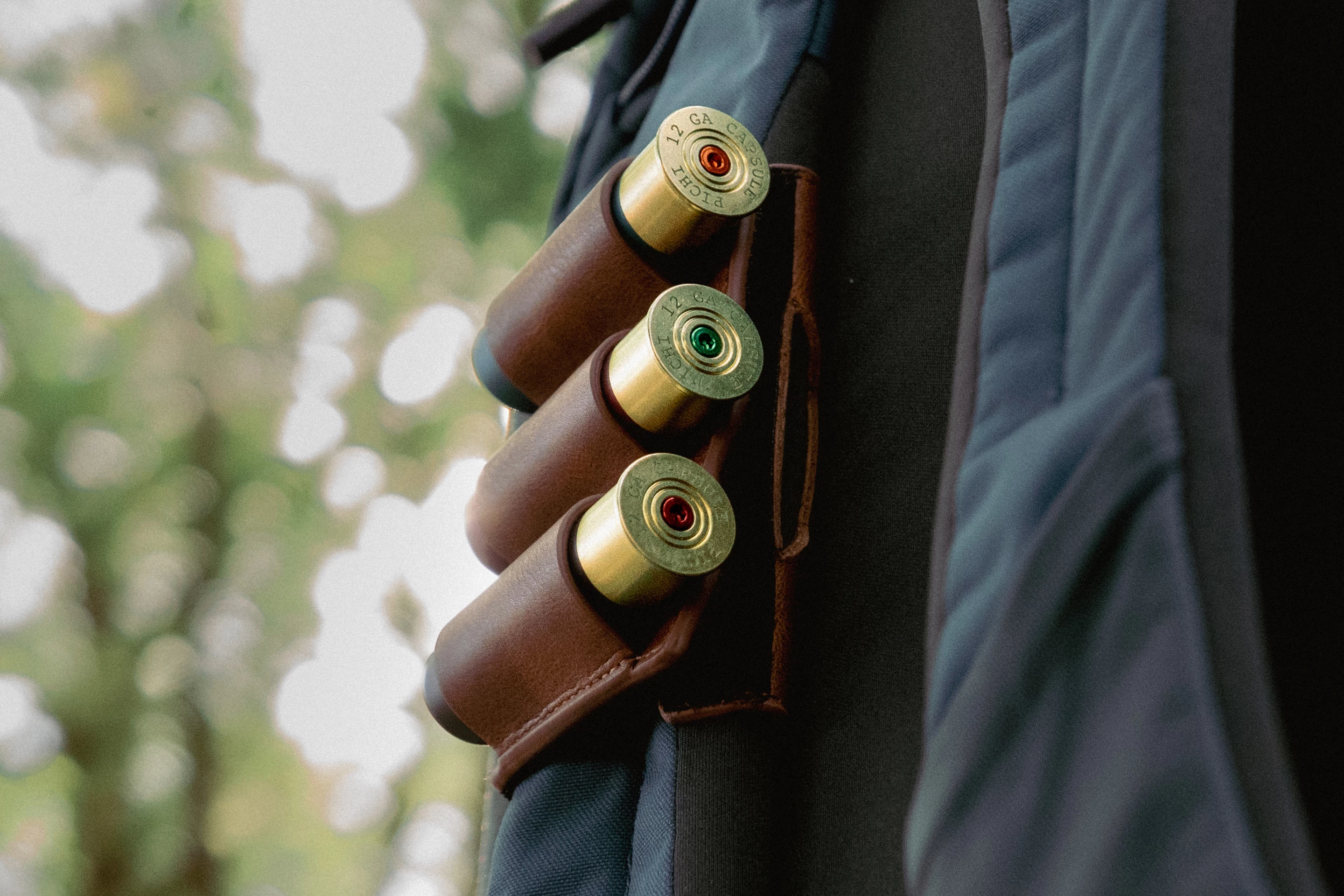 The Node-1's optional leather holster – optional colored screws in the caps allows users to tell multiple capsules apart