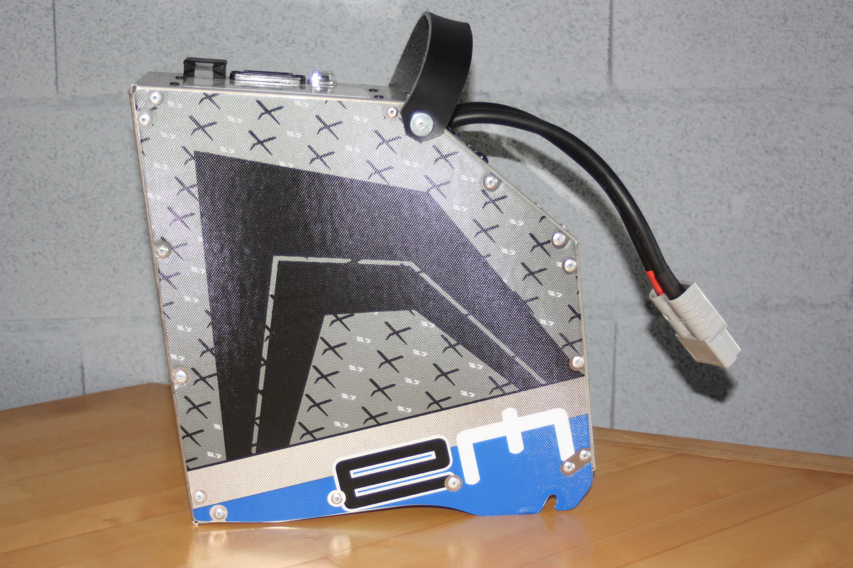 The custom-built, removable Li-Pol battery pack contained within an aluminum shell