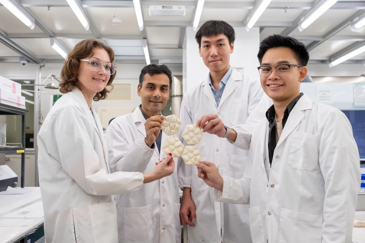 The tile team (from left): Assoc Prof Hortense Le Ferrand, Anuj Jain, Teo Jia Heng and Eugene Soh