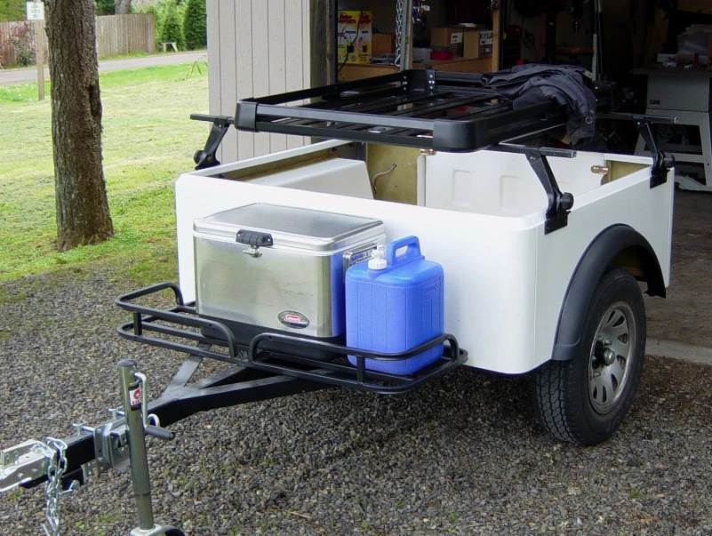 Cargo options include netting, spare tire mount, tie downs and nose box