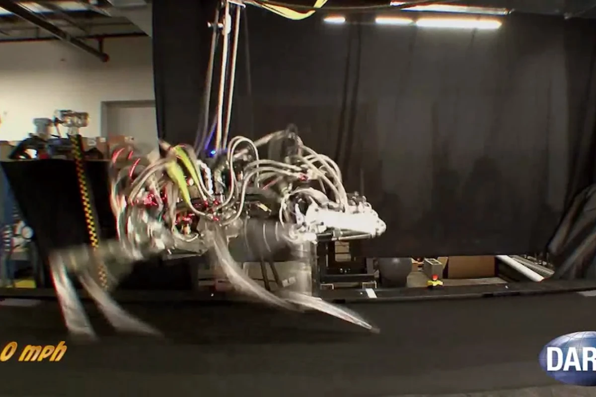 DARPA's quadruped CHEETAH robot has broken the land speed record for legged robots by reaching a gallop of 18 mph on a treadmill