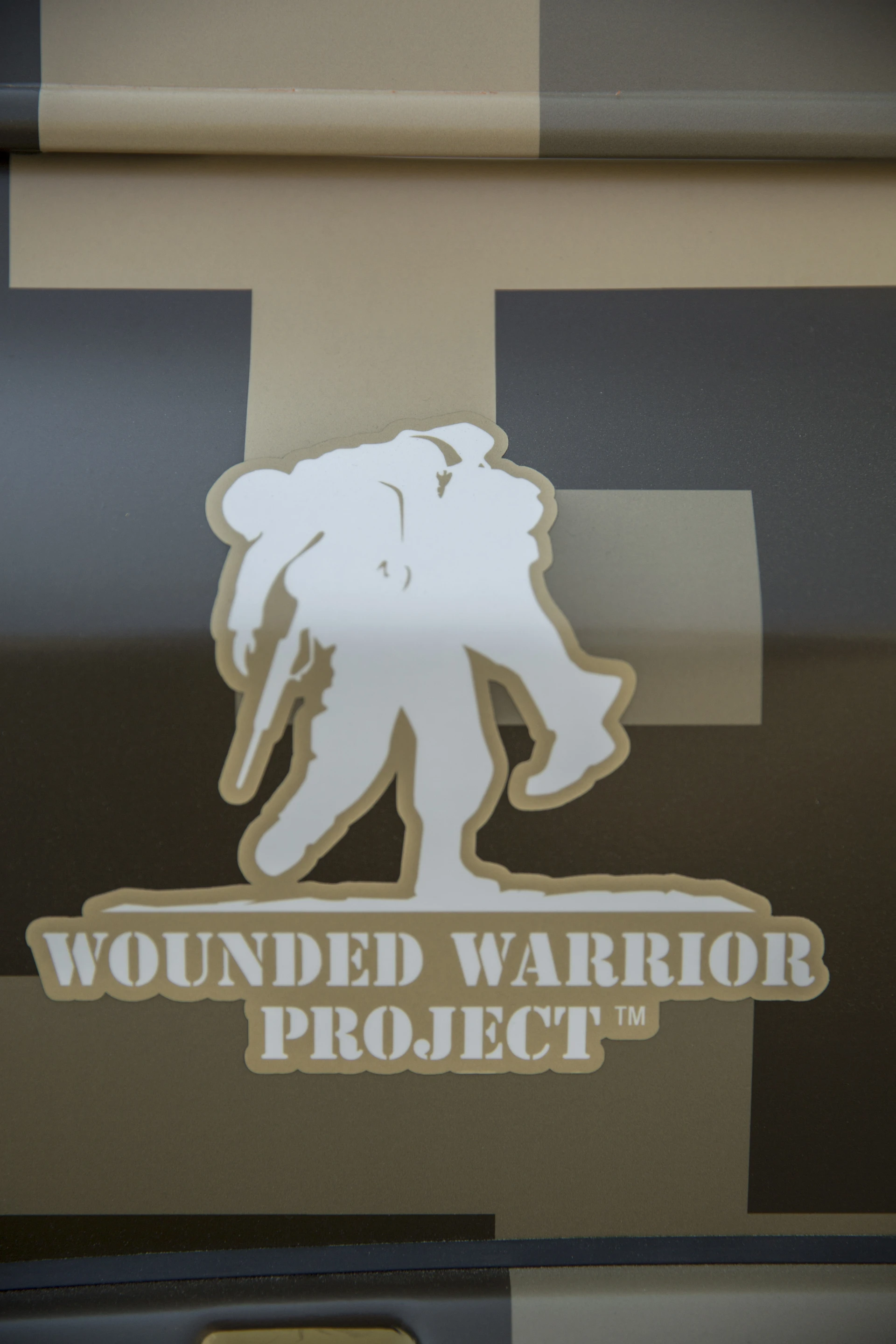 The Project Titan is being christened by two Wounded Warrior Project participants and veterans