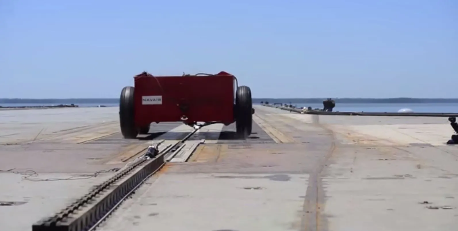 The dead-weight sled taking off