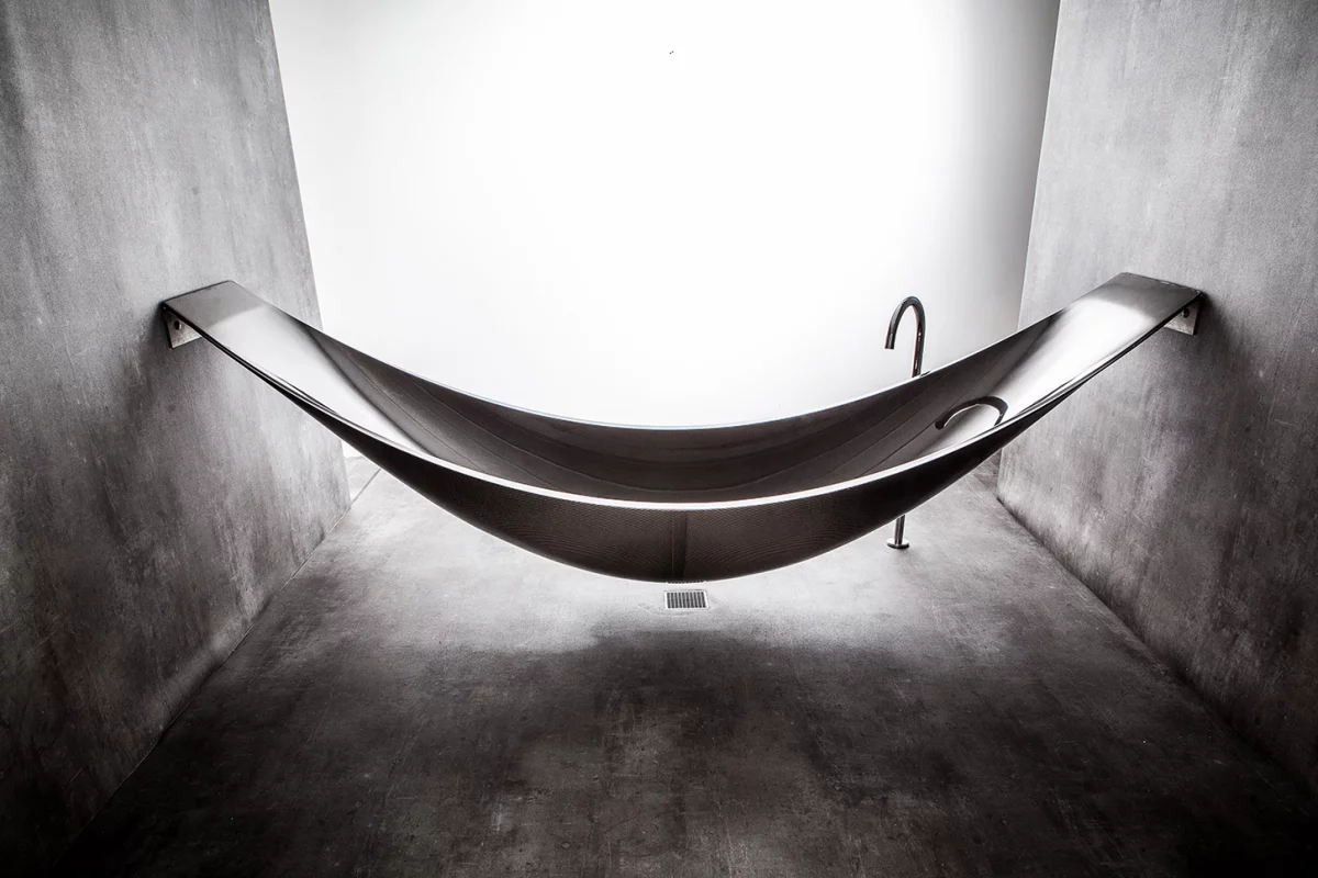 Splinter Works' Vessel is an unusual bathtub constructed from a carbon fiber weave