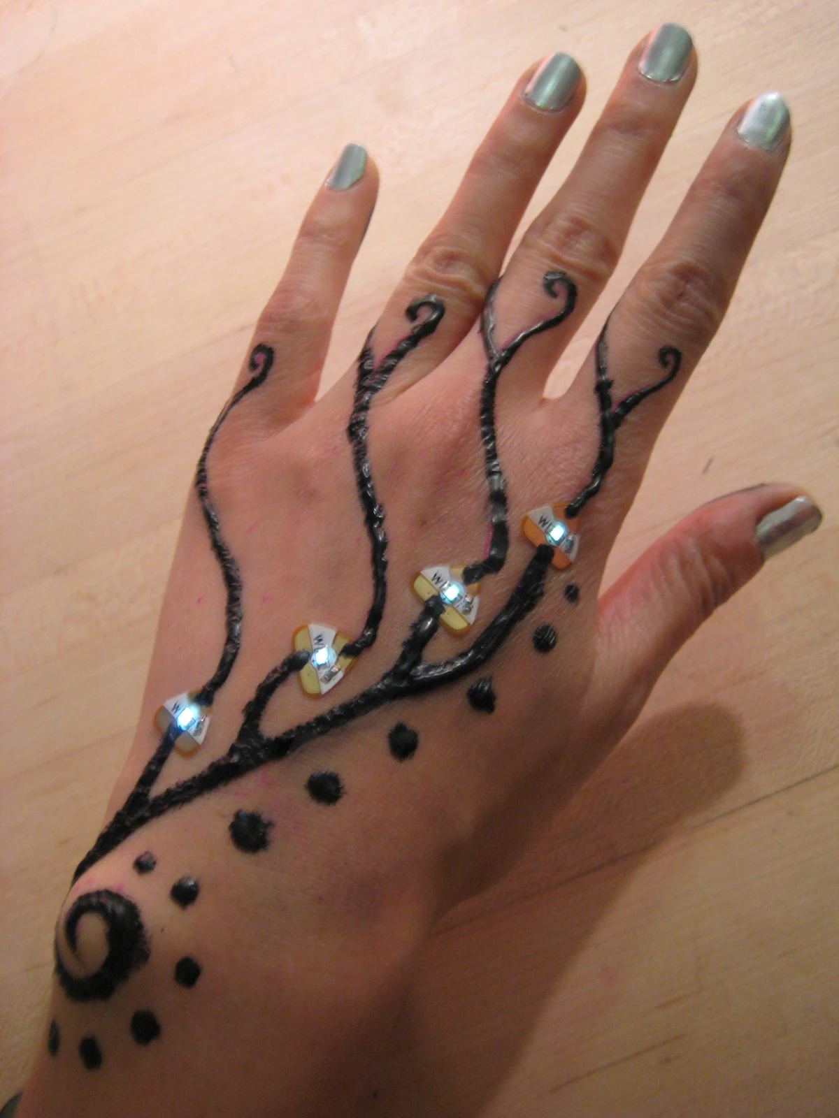 With the right conductive materials, Chibitronic stickers can be used to make wearable circuits