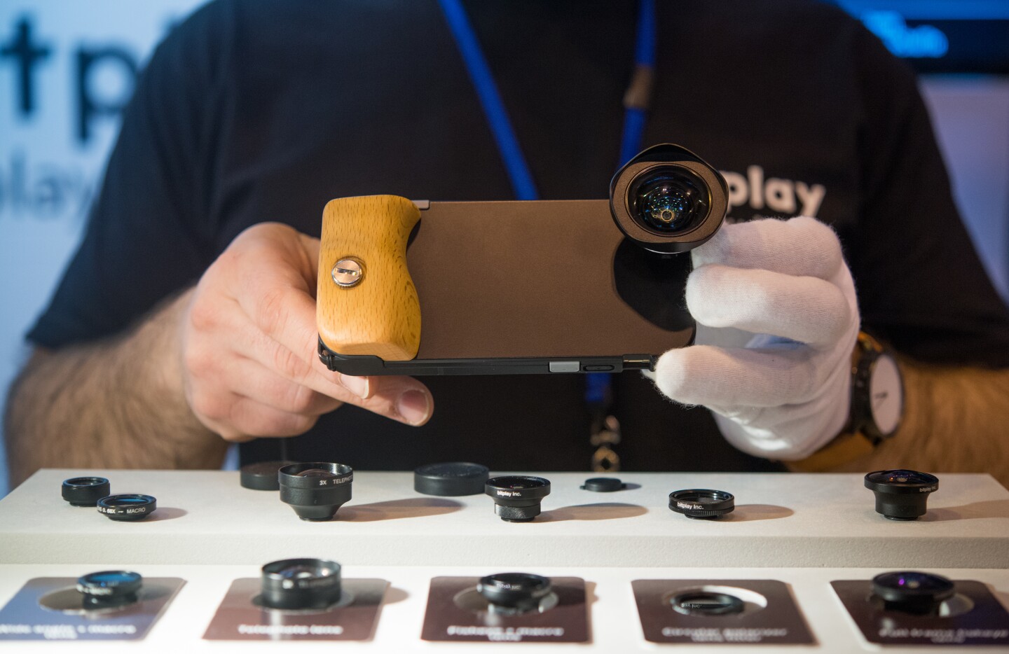 BitPlay consists of iPhone cases which add a physical shutter button, and screw-in lenses