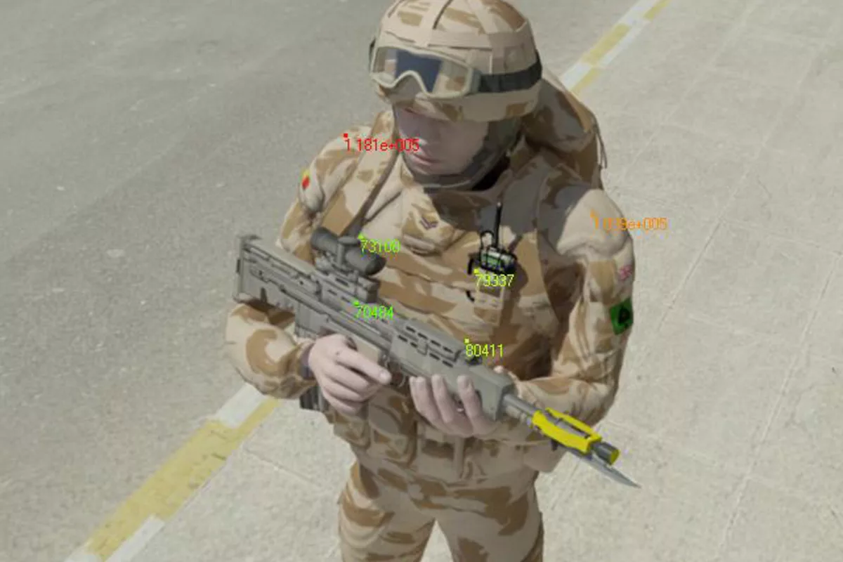 A soldier in a fictitious but realistic urban, desert environment, with superimposed numbers representing readings for anticipated sunlight (Image: EPSRC)