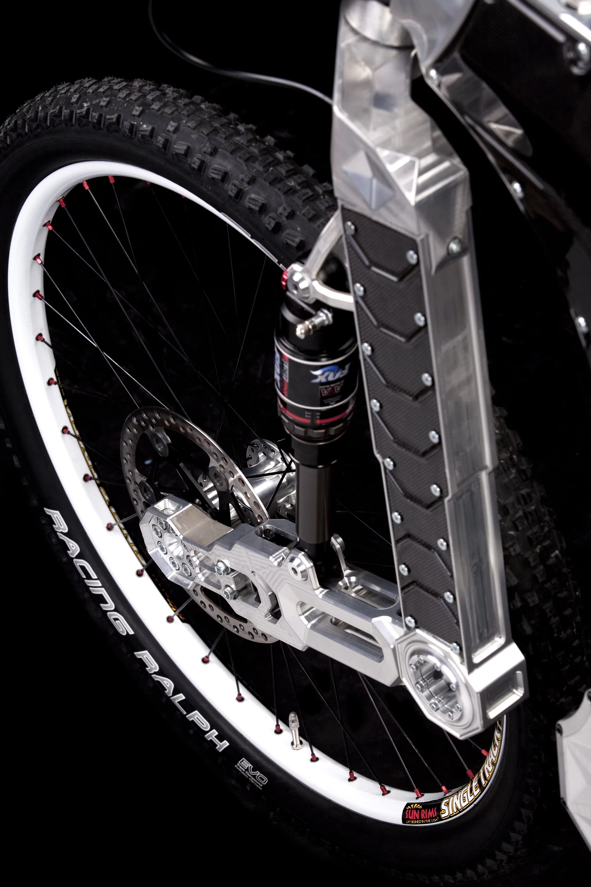 Close up of the patented single-arm front-suspension design of the M55 Terminus Biceps edition