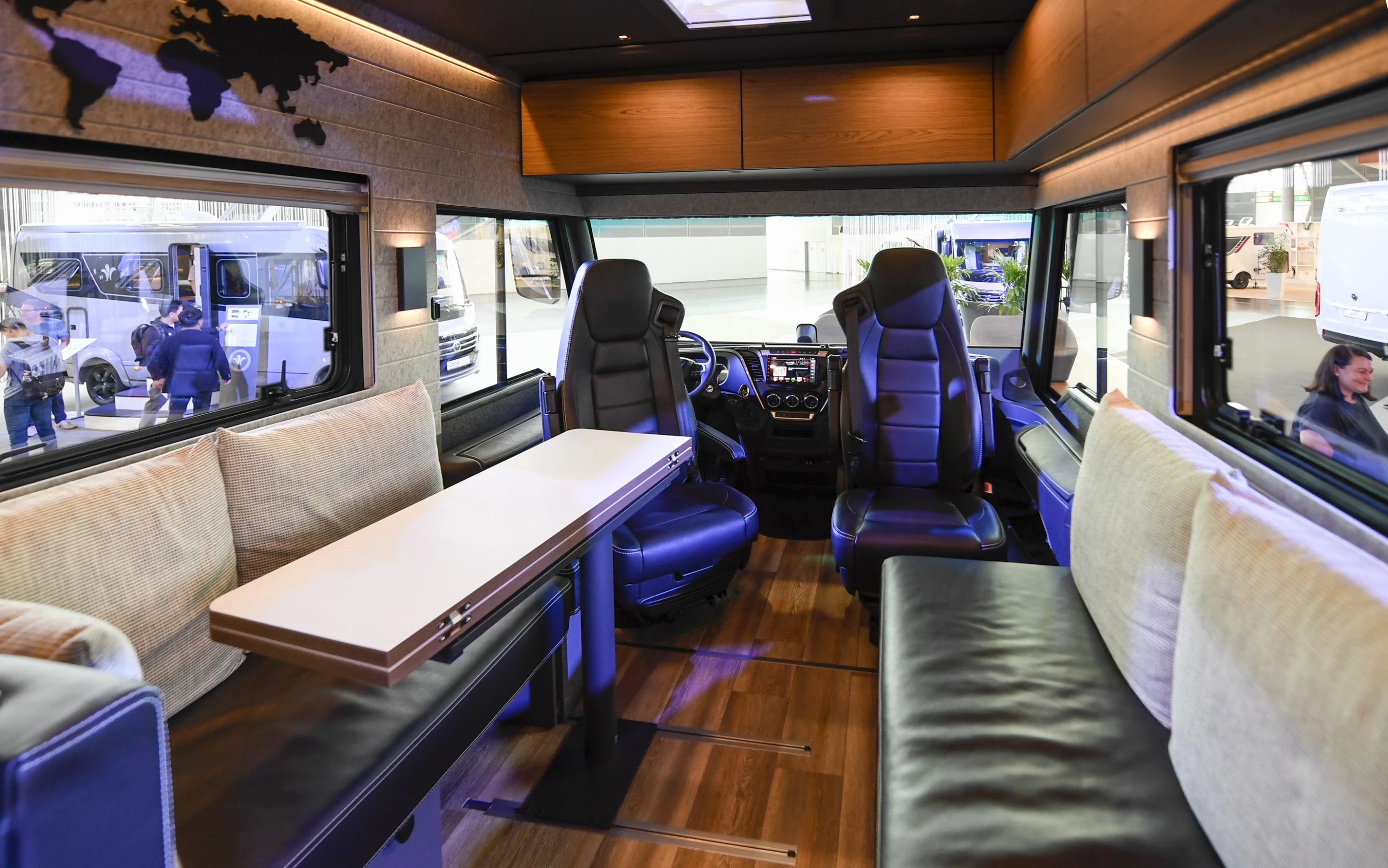 The highly versatile front lounge area works as a dining room, rear passenger bench and TV room