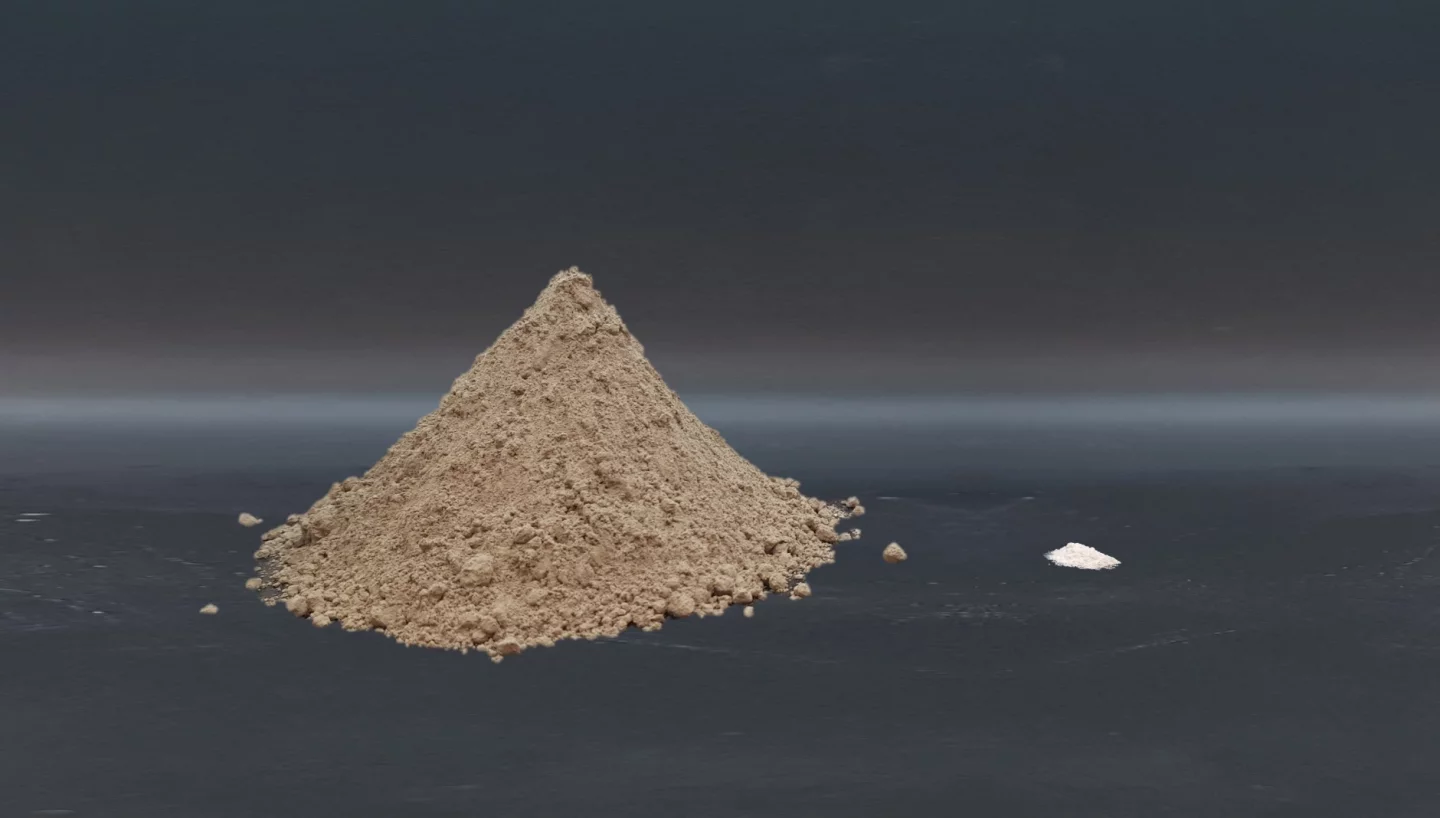 A pile of cement powder (left) and the amount of titanium dioxide nanoparticles (right) mixed into the cement to boost its carbon dioxide uptake