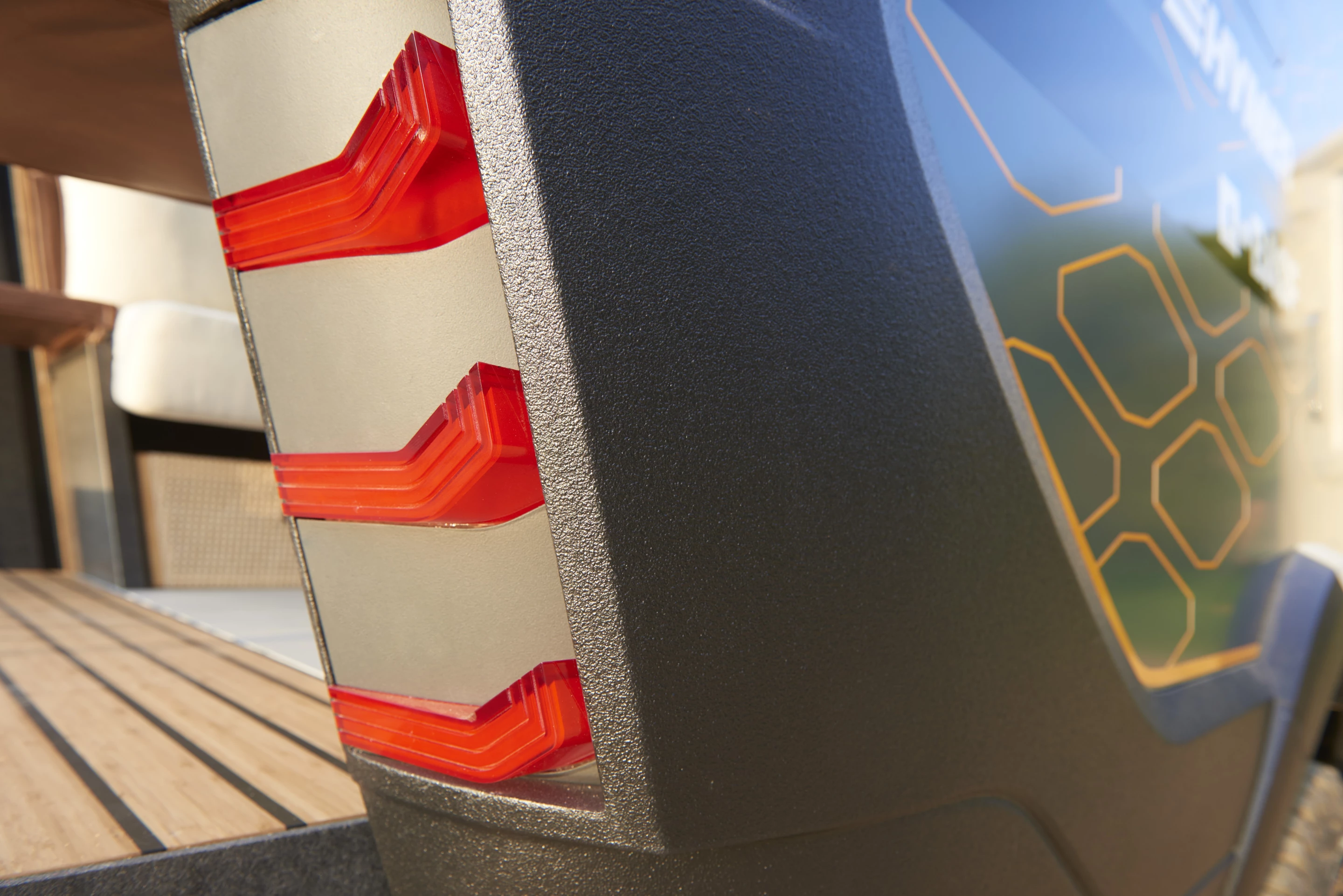 The slide-out grill hides behind the taillights