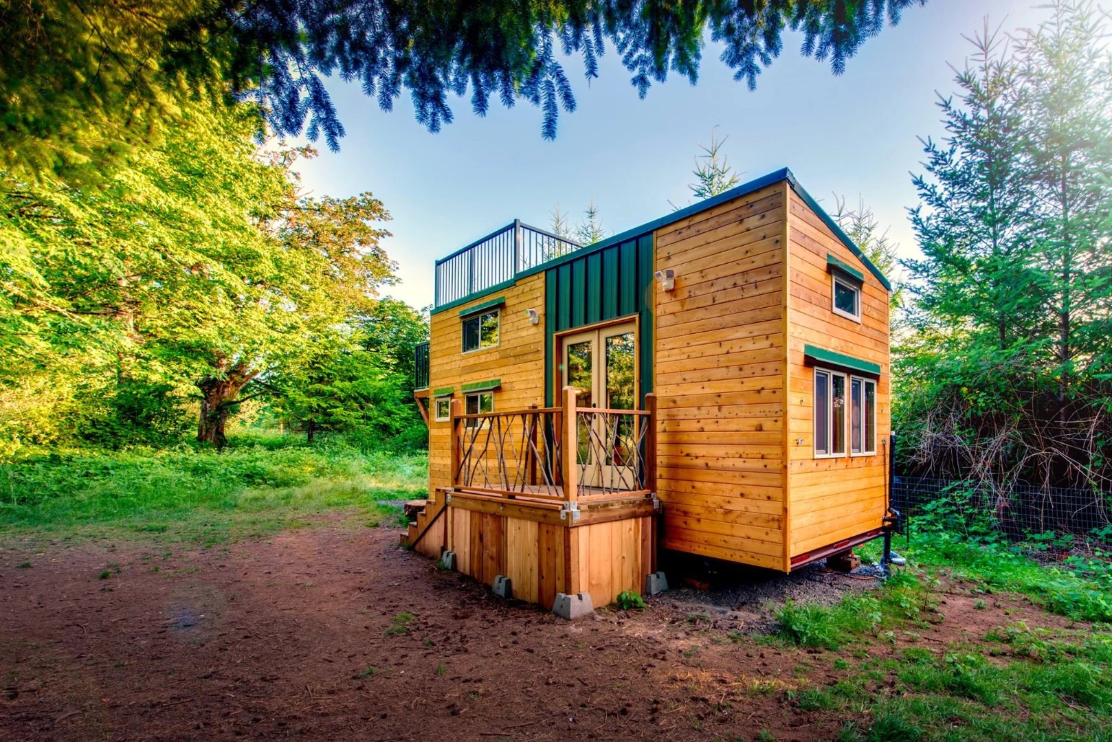 The tiny house features a large rooftop deck