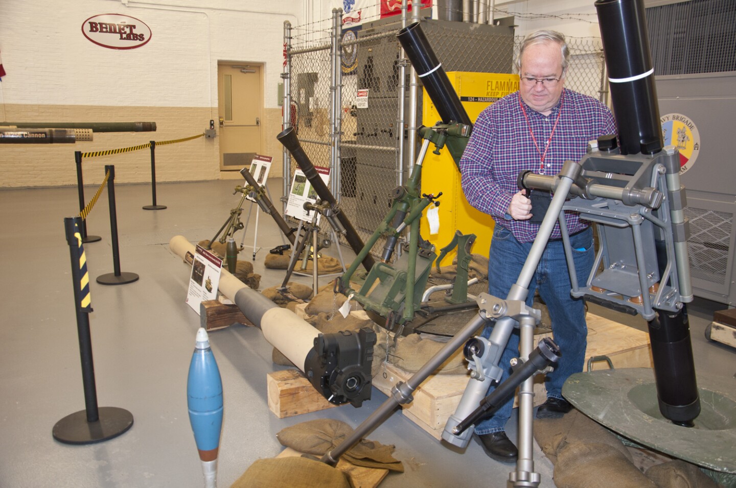Bob Cooley, a Benét Labs Integrated Process Team leader, adjusting the newly redesigned 120-mm mortar bipod