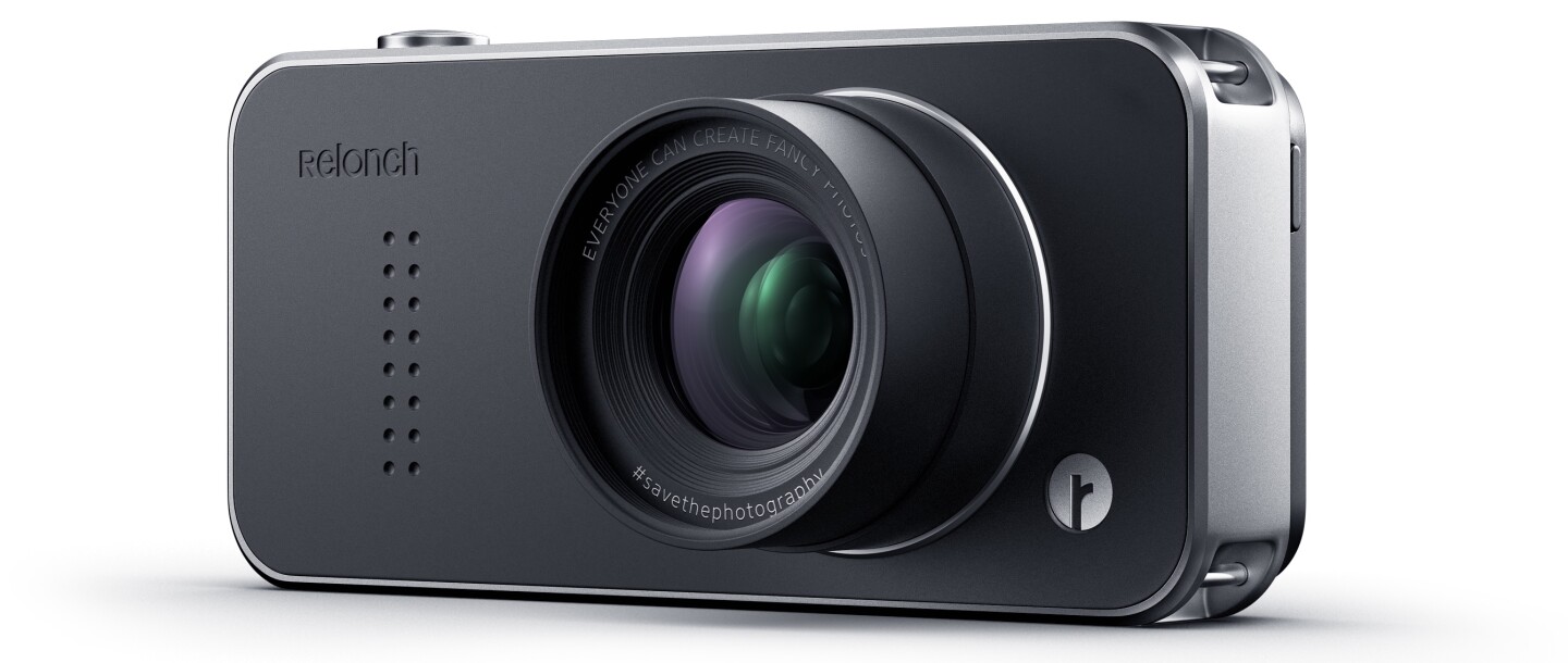 It features a fixed-length "normal lens with large aperture" (no specs are available yet) and a large APS-C size sensor