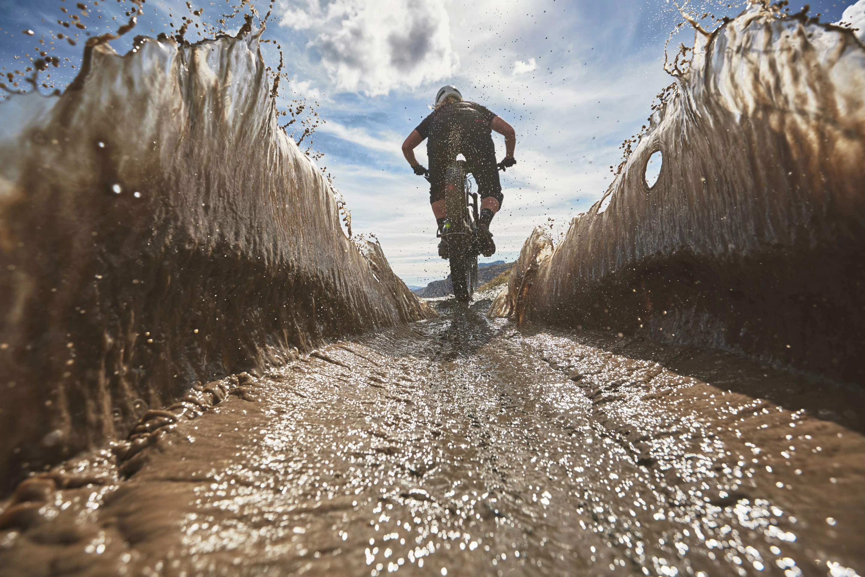 The winner of the Innovation (by Sony) category was Laurence Crossman-Emms of the UK, for a striking shot of Katy Winton parting a mud puddle like Moses, in North Wales