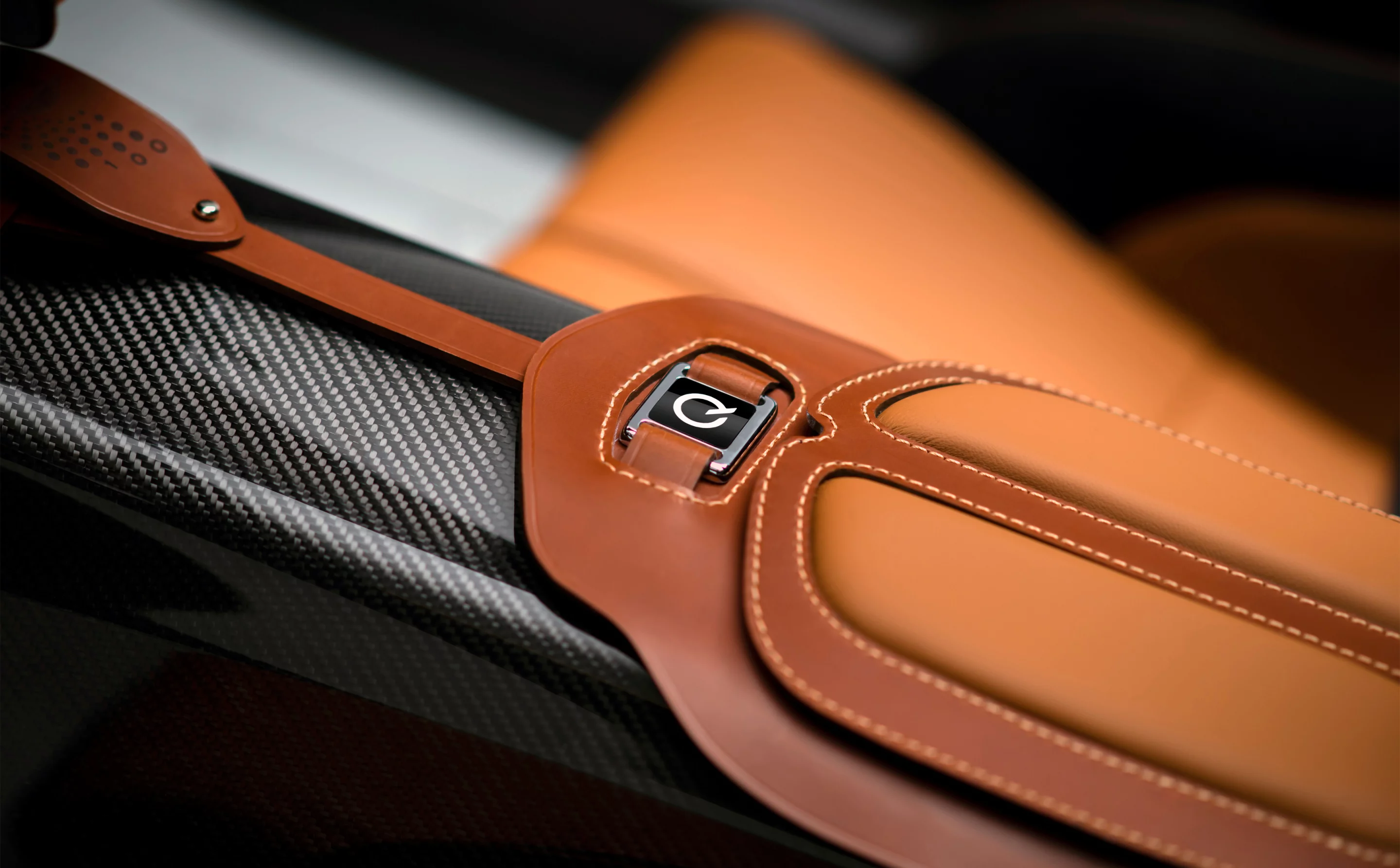 Leather versus carbon fiber further reinforces the old vs new design case