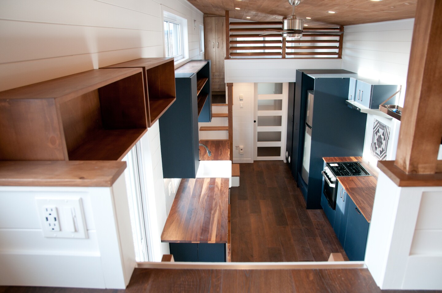 The Charme V2's interior decor is reminiscent of other tiny houses by Minimaliste and looks modern and clean, flattering the small space