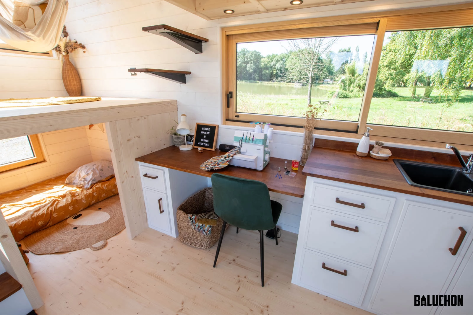 Next to the Nouvelle Dans' kitchen area is a small hobby area with a place for the owner's sewing machine