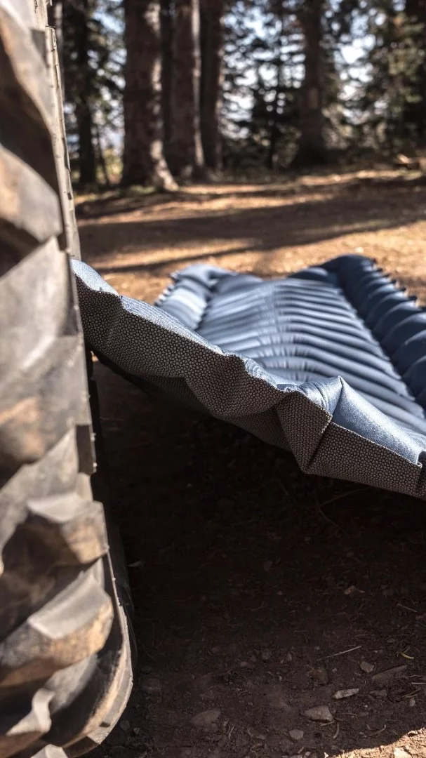 The Klymit Armored V relies on a "SuperFabric" bottom to hold up to the rough, uneven terrain below the tent floor